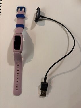 Fitbit Ace 3 with USB charging cord